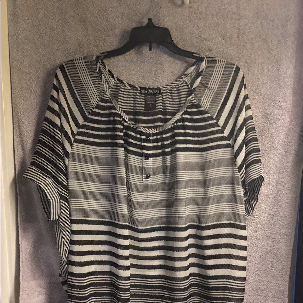 Size L  sheer black and white blouse.